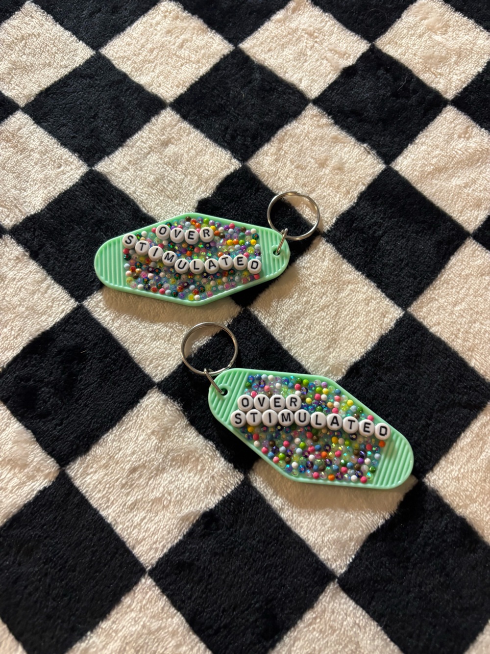2 Overstimulated matching bestie keychains